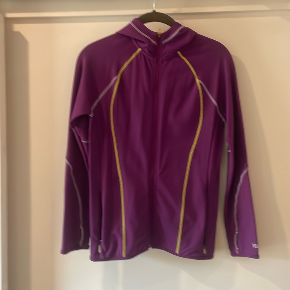 Marmot Women’s lightweight hooded jacket, XS, purple with yellow and white.